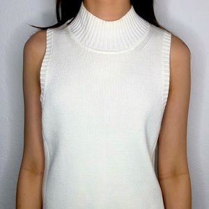 White turtle-neck sweater